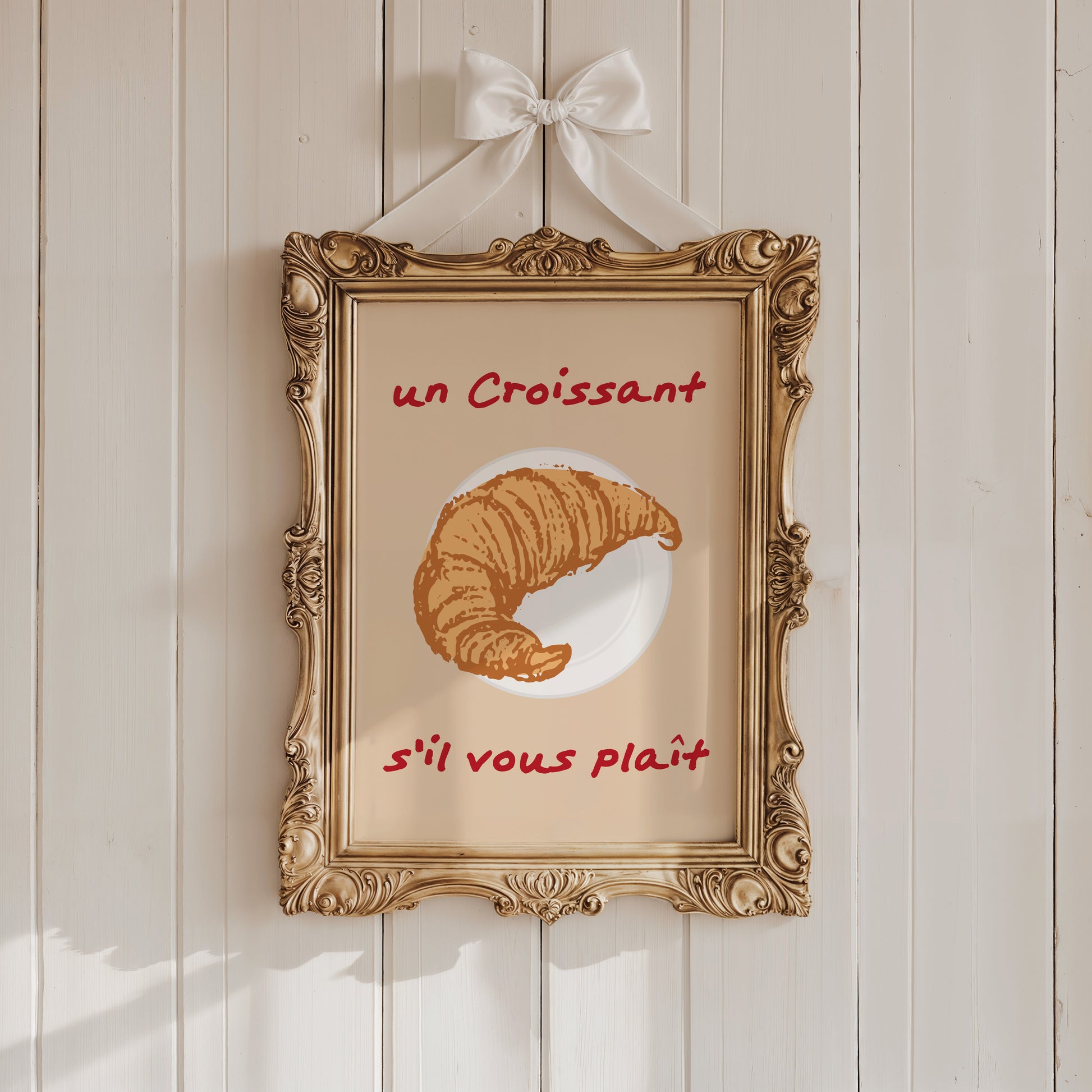 Printable croissant poster with French phrase for food lovers.