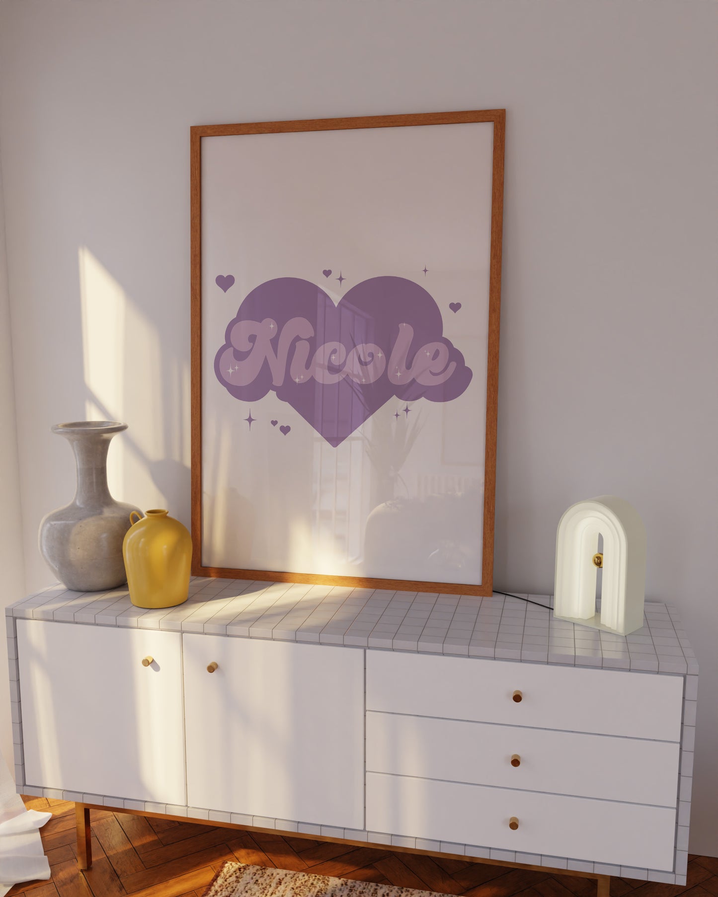 Personalised purple wall art with a name in a heart design, perfect for a girl's bedroom.